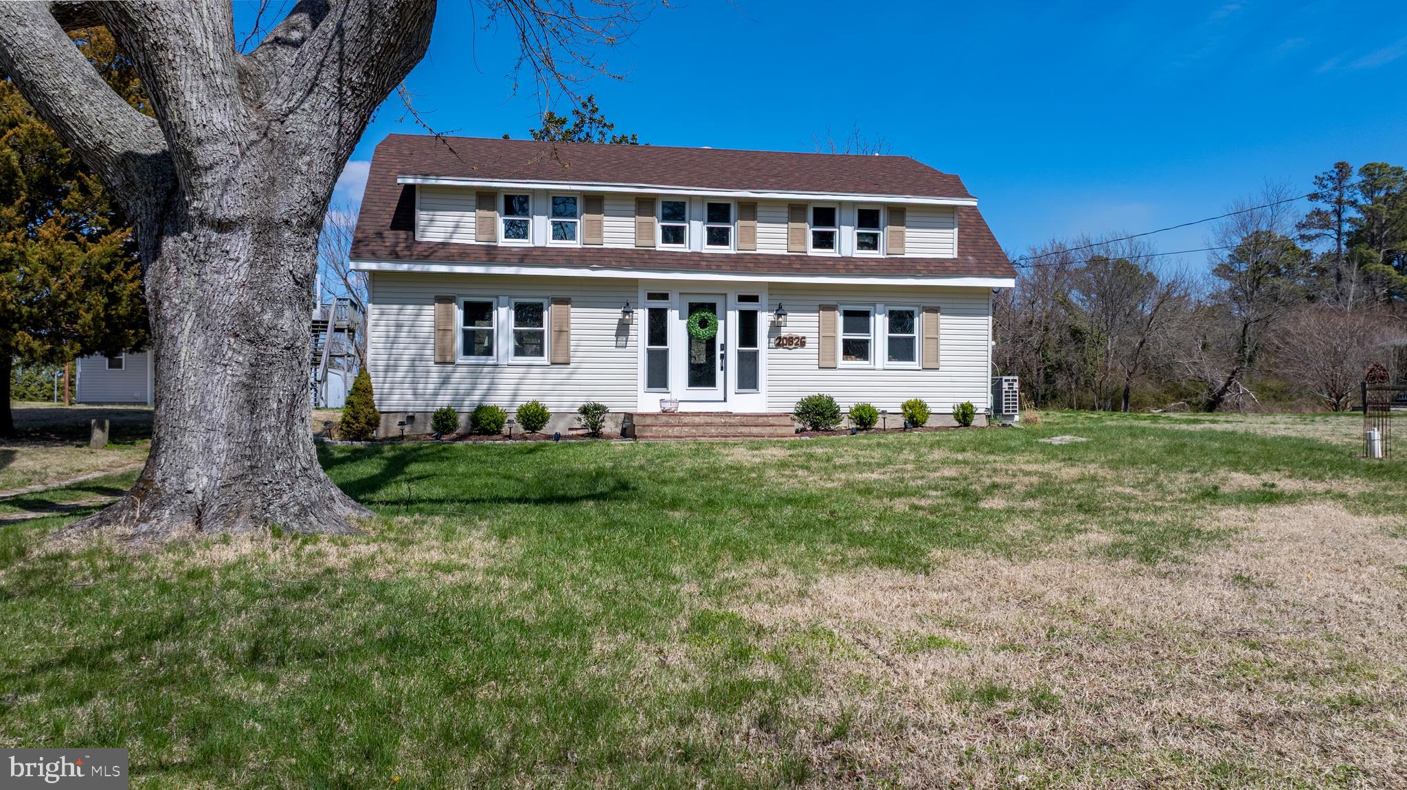 20826 Bivalve Wharf Road Bivalve, MD 21865 - Photo 51 of 52 a front view of a house with a yard