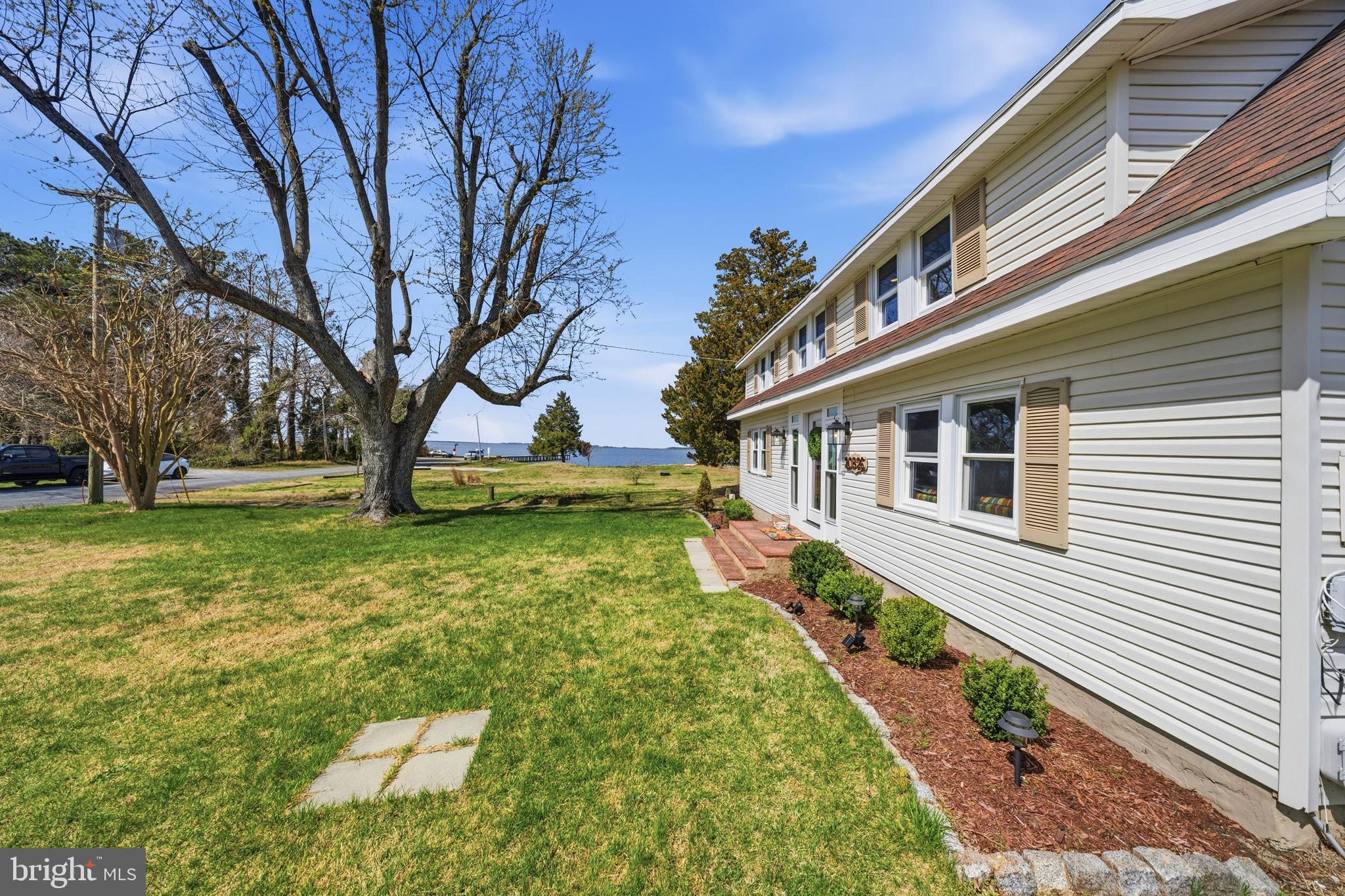 20826 Bivalve Wharf Road Bivalve, MD 21865 - Photo 52 of 52 a front view of a house with a yard