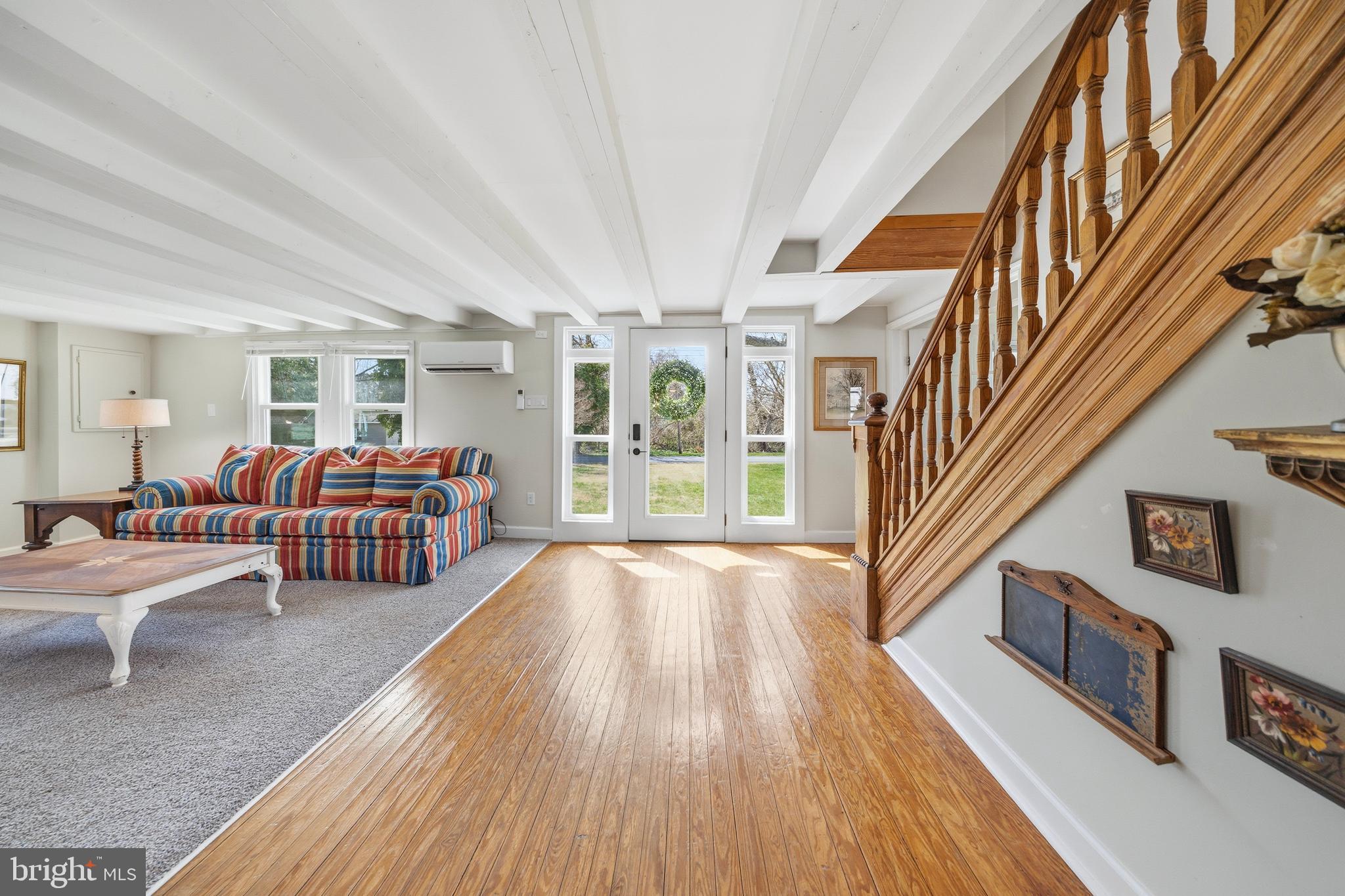 20826 Bivalve Wharf Road Bivalve, MD 21865 - Photo 8 of 52 a living room with furniture and a flat screen tv