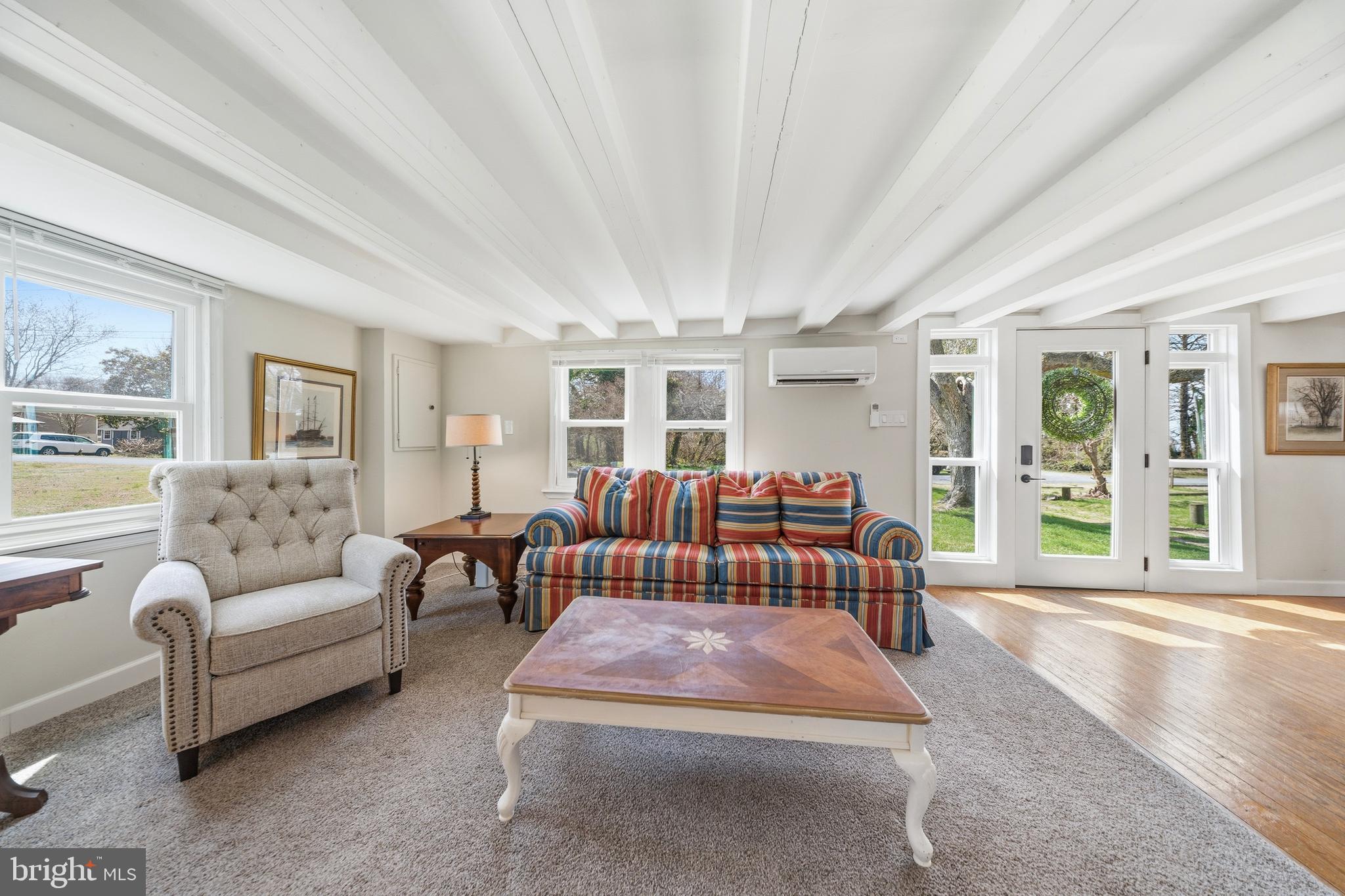20826 Bivalve Wharf Road Bivalve, MD 21865 - Photo 9 of 52 a bedroom with furniture and a large window