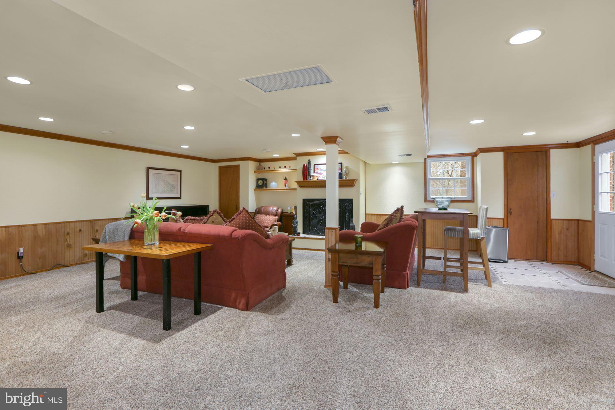 10613 Pineview Road Manassas, VA 20111 - Photo 21 of 51 Lower Level Recreation room with fireplace
