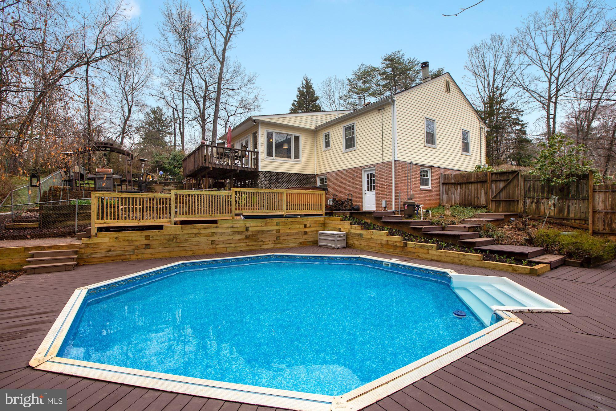 10613 Pineview Road Manassas, VA 20111 - Photo 33 of 51 in ground pool with decking
