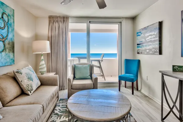 a living room with furniture and a window