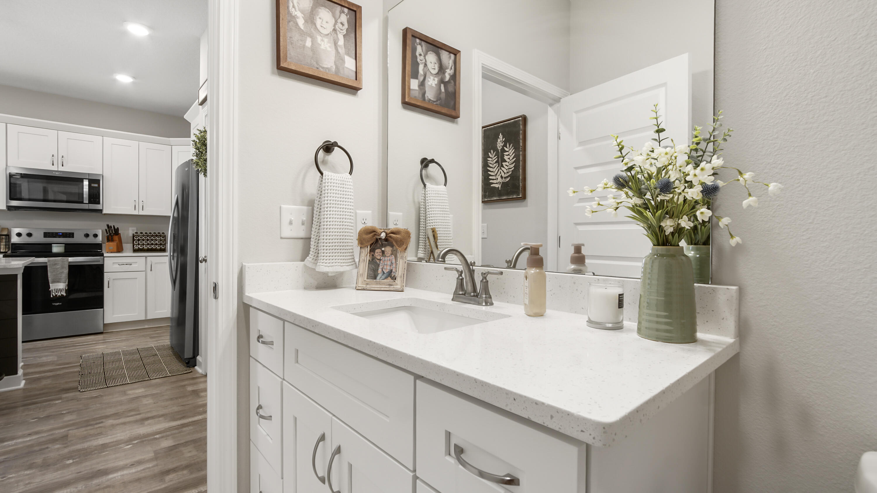 50 Jessica Court Freeport, FL 32439 - Photo 13 of 52 a kitchen with kitchen island a sink appliances and cabinets