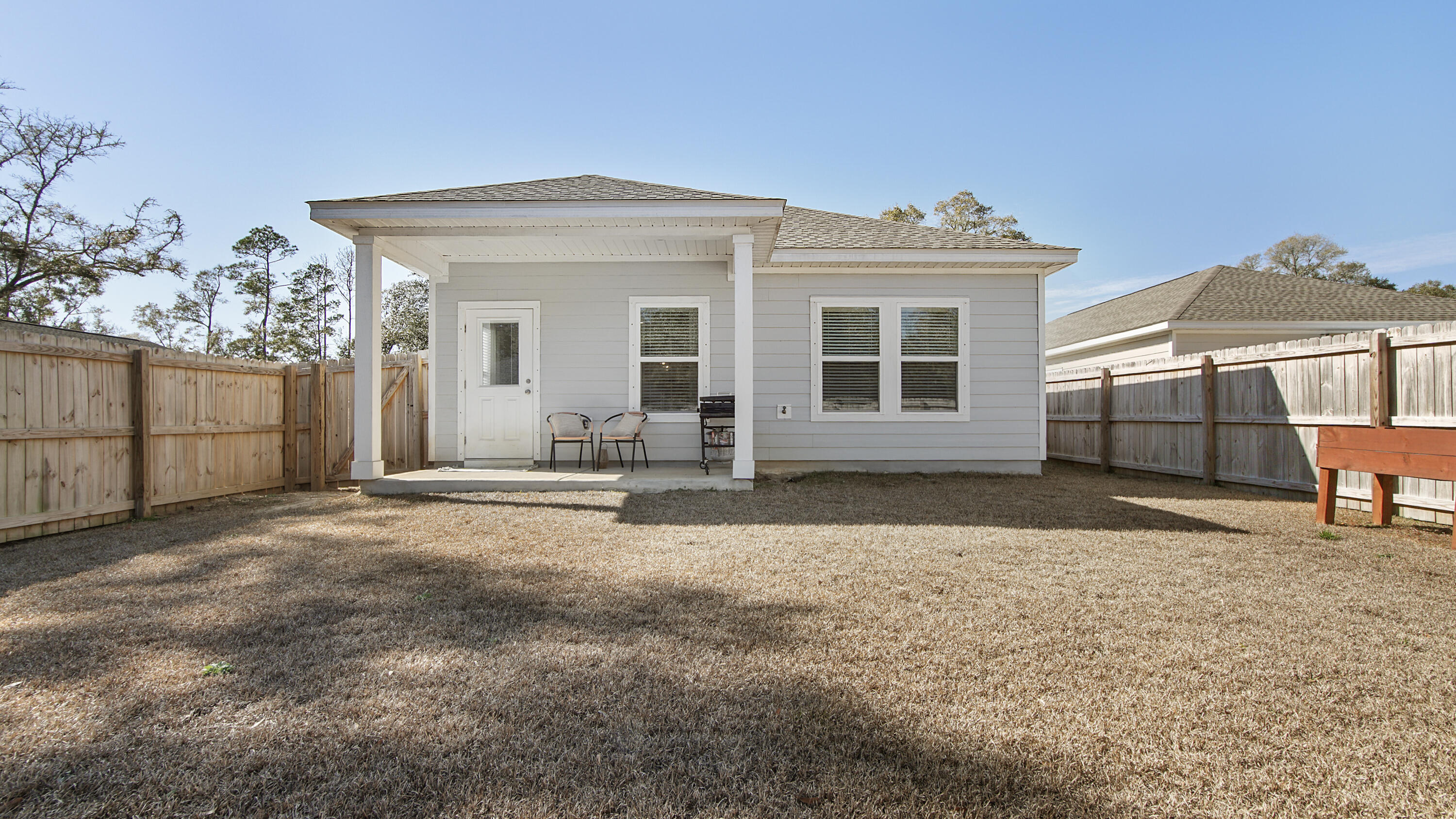 50 Jessica Court Freeport, FL 32439 - Photo 29 of 52 a front view of a house with garden