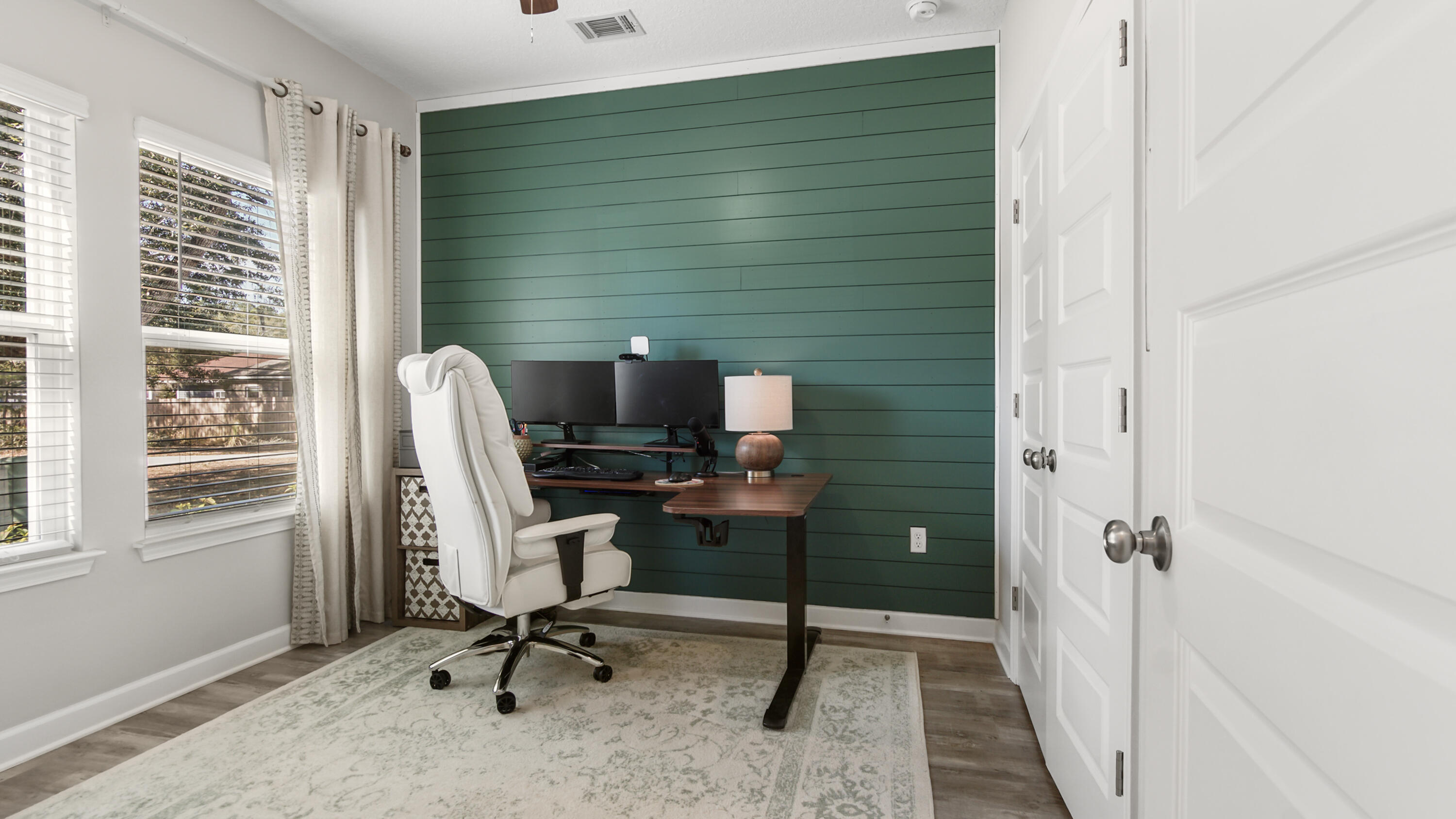 50 Jessica Court Freeport, FL 32439 - Photo 7 of 52 a view of a workspace with furniture and a window