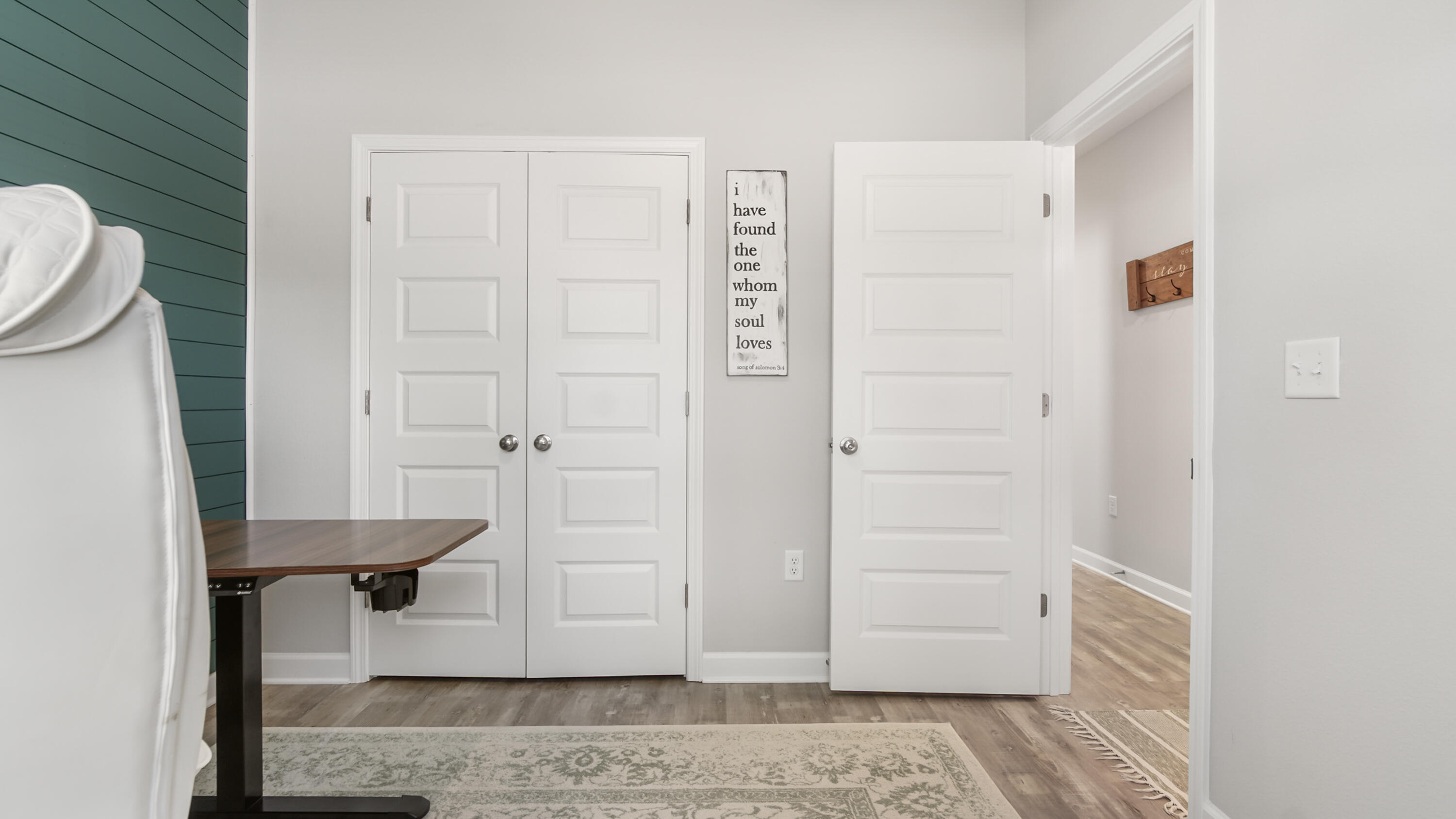 50 Jessica Court Freeport, FL 32439 - Photo 9 of 52 wooden floor and chair in a room
