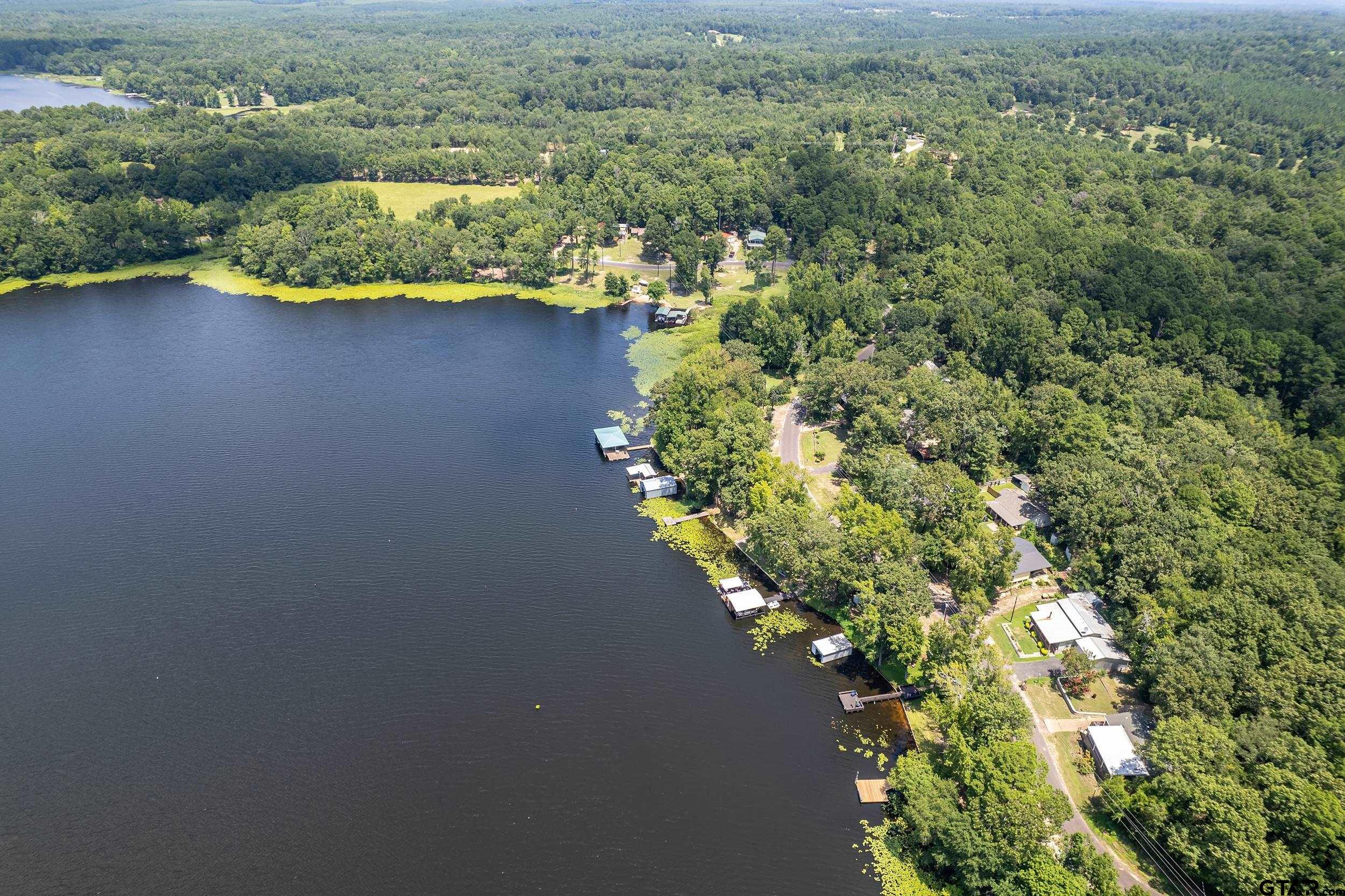 749 County Road 3420 Hawkins, TX 75765 - Photo 22 of 29 an aerial view of a residential houses with yard and swimming pool
