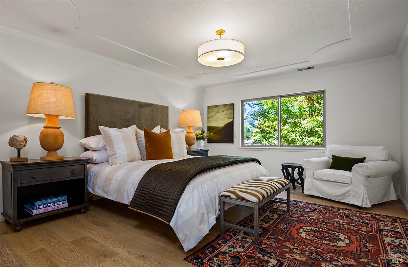 231 Zinfandel Road Healdsburg, CA 95448 - Photo 22 of 47 Primary en-suite overlooking rear yard with gardens and mature trees.