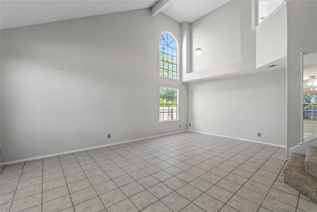 a view of an empty room and window