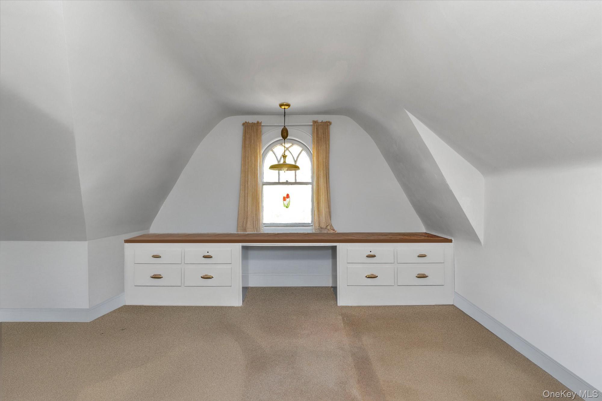 57 Beacon Hill Road Port Washington, NY 11050 - Photo 19 of 25 a view of an empty room with window