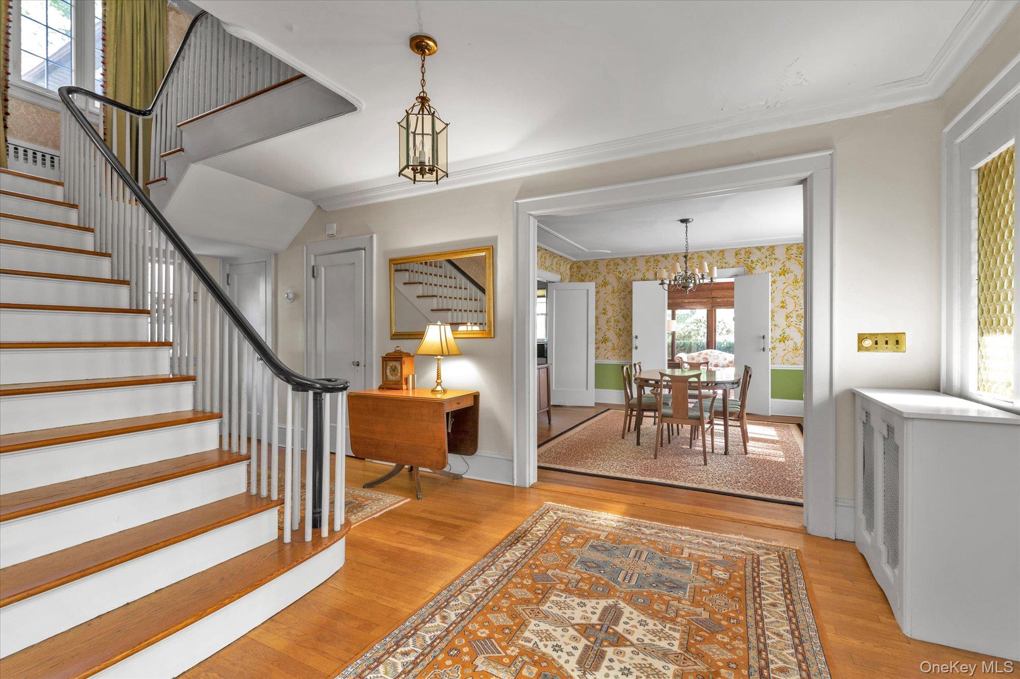 57 Beacon Hill Road Port Washington, NY 11050 - Photo 5 of 25 a view of a livingroom with furniture and a rug