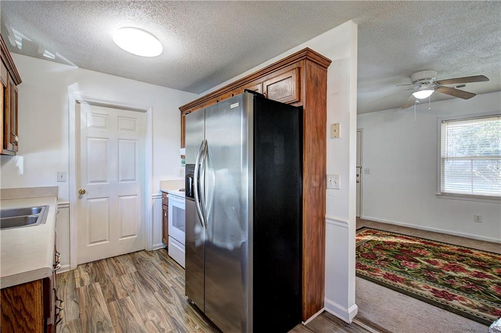 302 Douglas Street Cartersville, GA 30120 - Photo 16 of 29 a view of front door with wooden floor