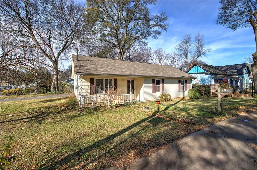 302 Douglas Street Cartersville, GA 30120 - Photo 3 of 29 a view of a house with backyard