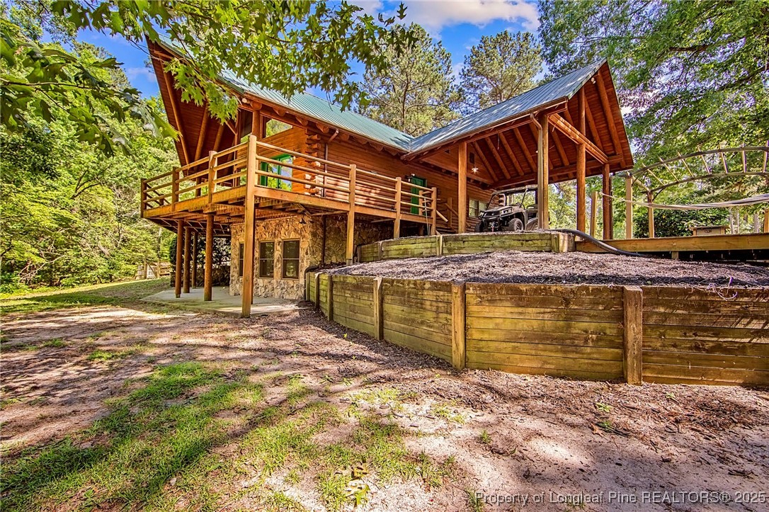 329 Silver Grove Church Road Rockingham, NC 28379 - Photo 2 of 36 a view of a house with a yard