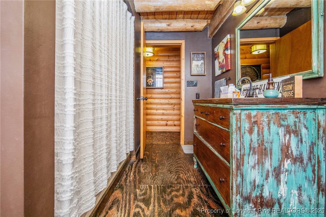 329 Silver Grove Church Road Rockingham, NC 28379 - Photo 25 of 36 a bathroom with a sink and a mirror