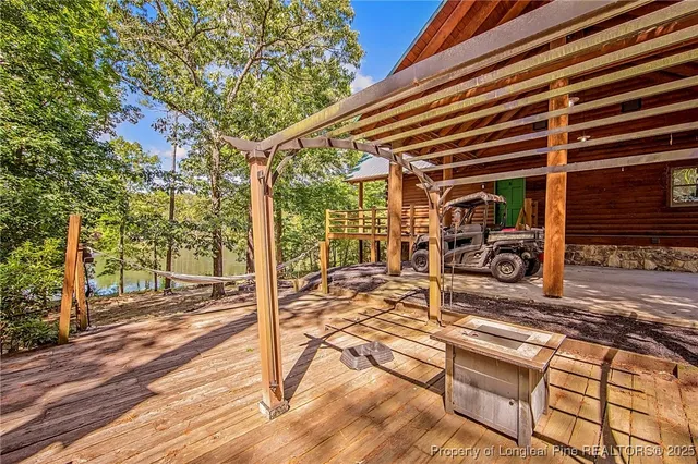 a view of a backyard with sitting area