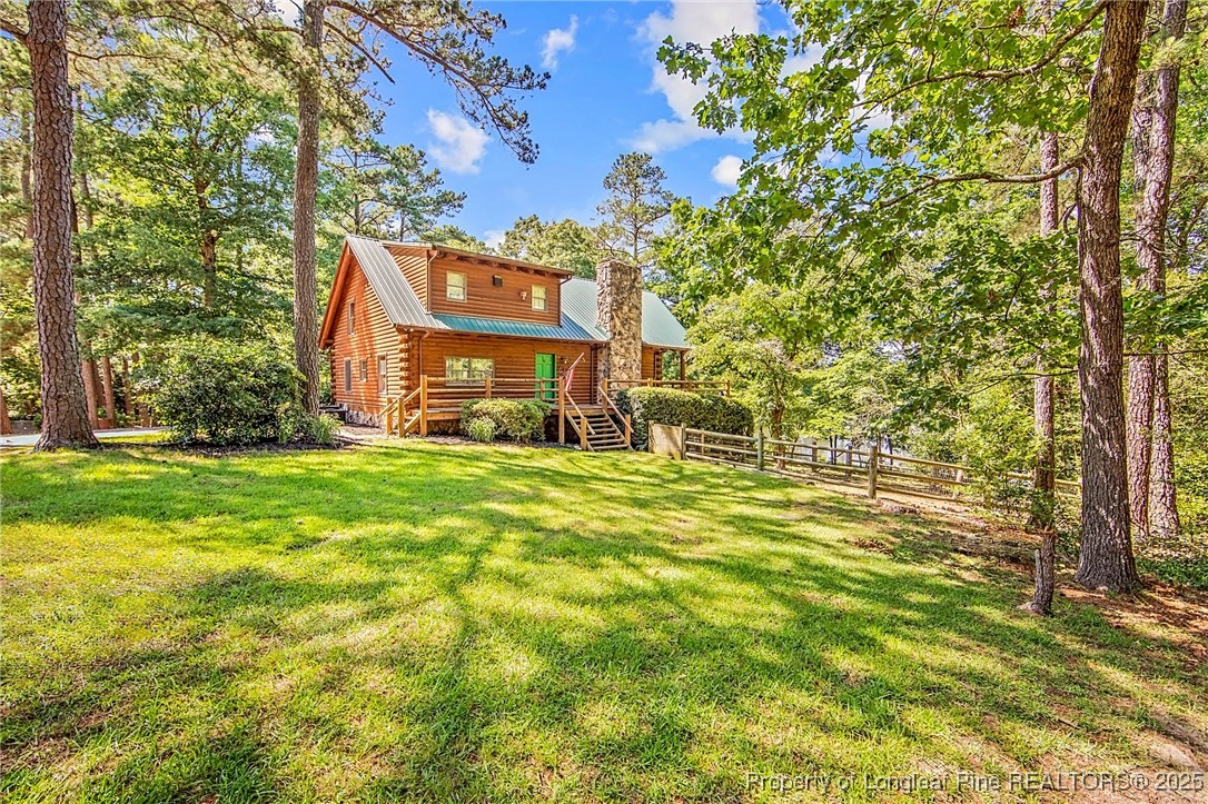 329 Silver Grove Church Road Rockingham, NC 28379 - Photo 31 of 36 a sign board with yard in front of it