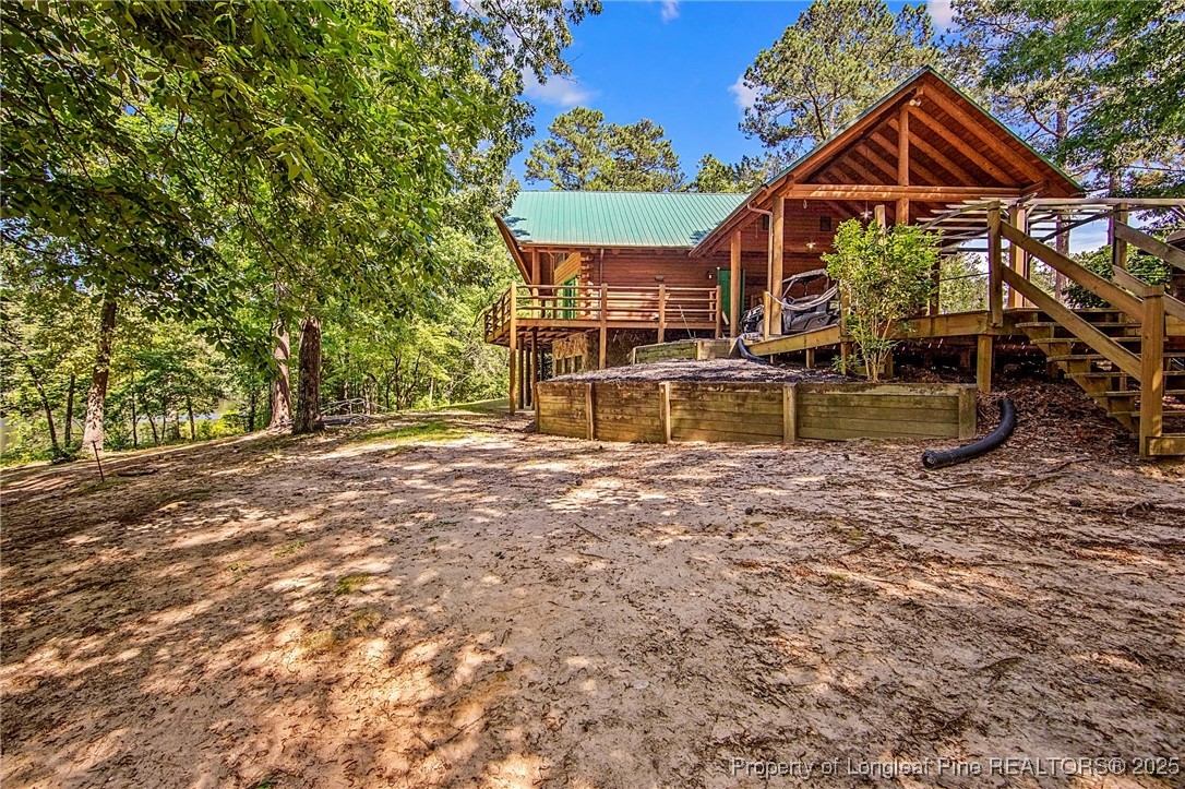 329 Silver Grove Church Road Rockingham, NC 28379 - Photo 35 of 36 a view of a house with a yard