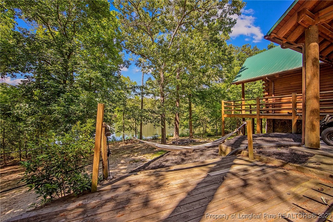 329 Silver Grove Church Road Rockingham, NC 28379 - Photo 4 of 36 a blue sign that is sitting in the middle of a yard