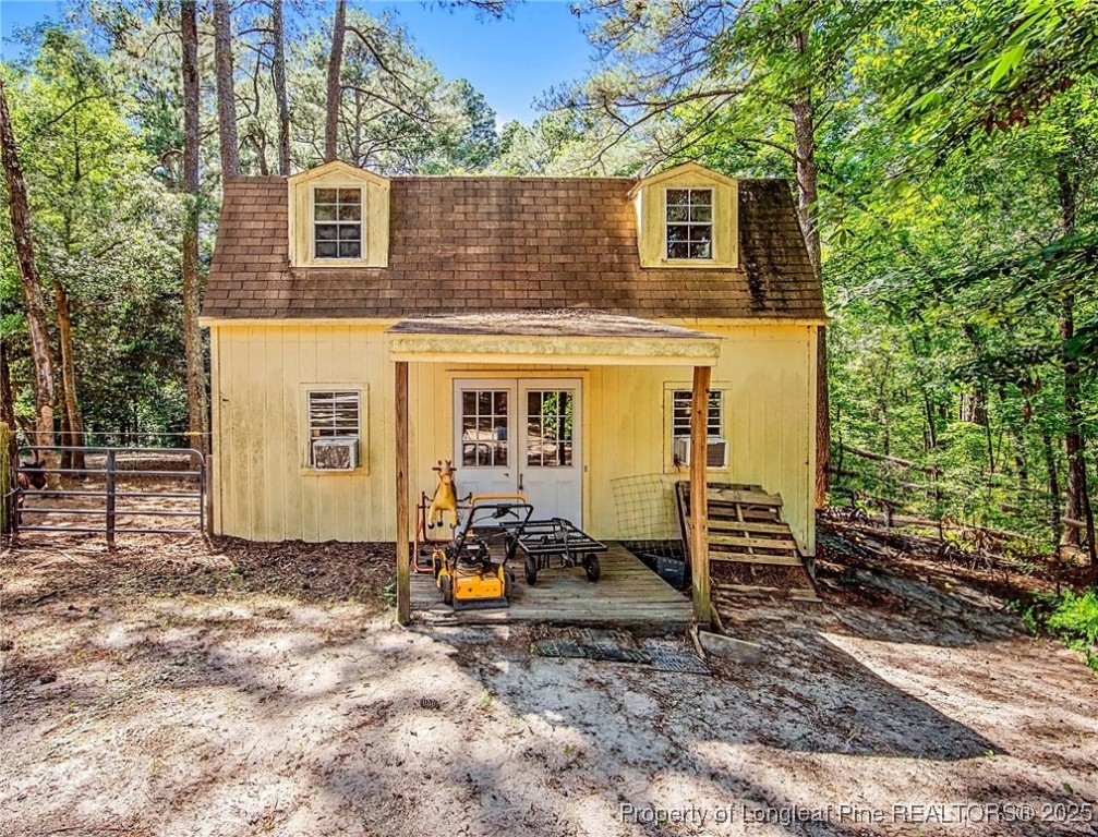 329 Silver Grove Church Road Rockingham, NC 28379 - Photo 10 of 36 front view of a house with a yard