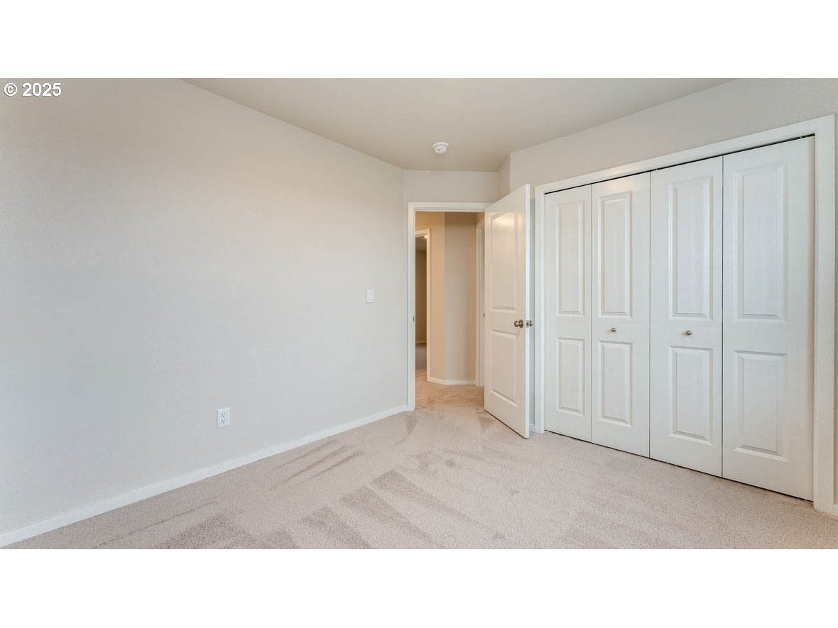 2315 30th Place Springfield, OR 97477 - Photo 14 of 27 a open hall with a elevator
