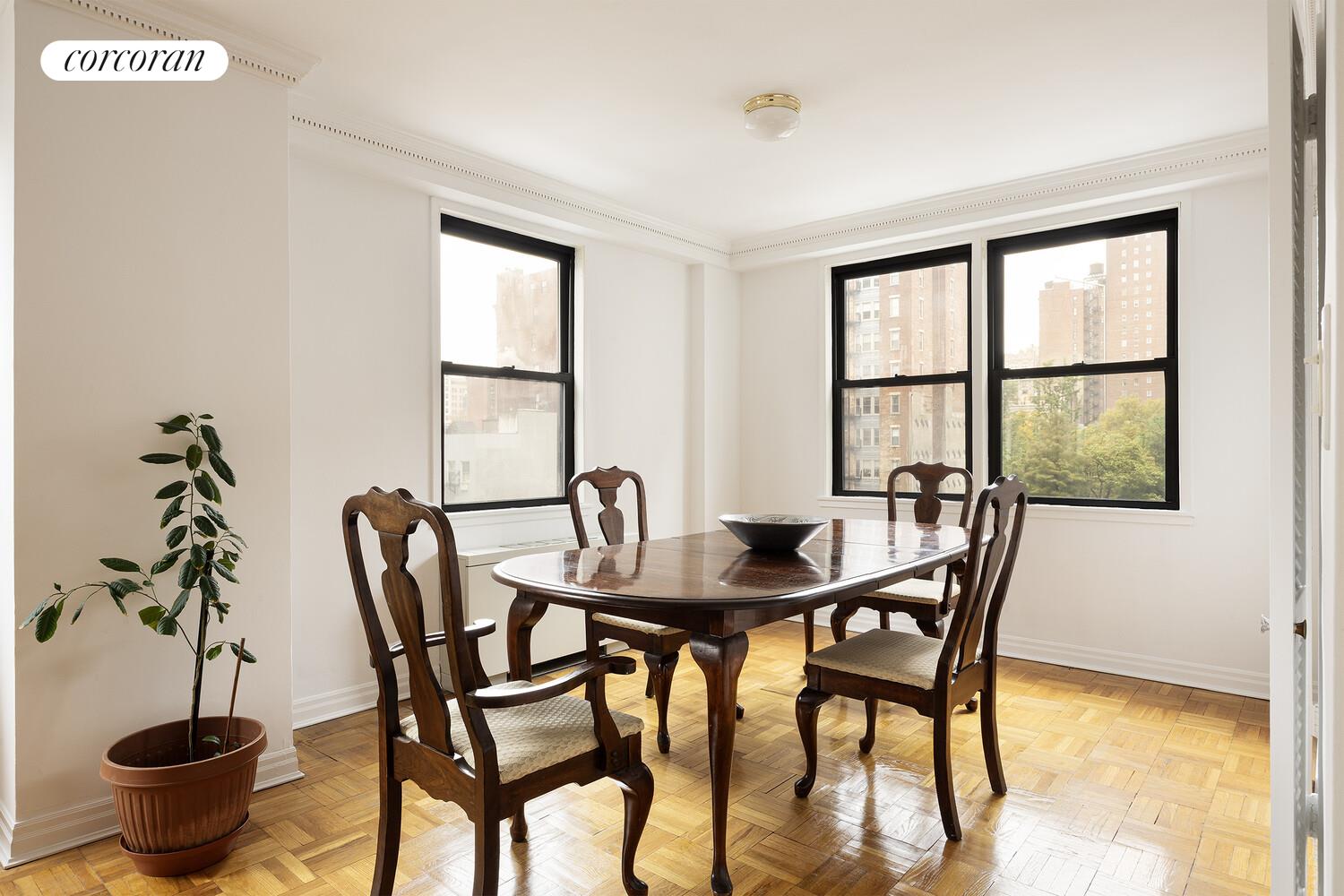 201 East 21st Street, Unit 7S Manhattan, NY 10010 - Photo 4 of 12 a view of a dining room with furniture and window