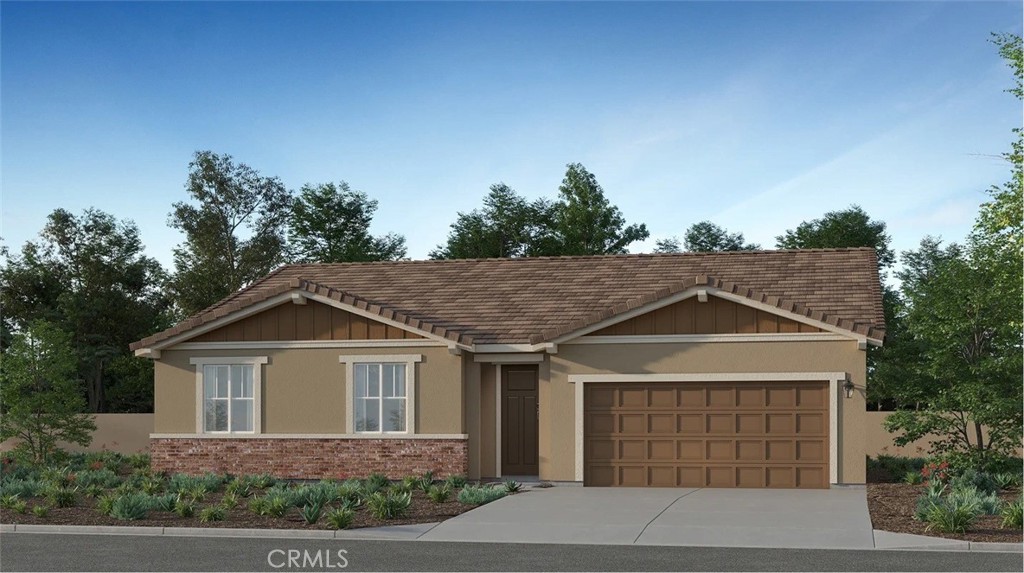 24812 Sirius Avenue Moreno Valley, CA 92551 - Photo 15 of 16 a front view of a house with a yard