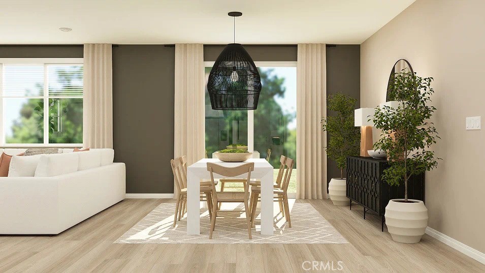 24812 Sirius Avenue Moreno Valley, CA 92551 - Photo 4 of 16 a living room with furniture and a large window