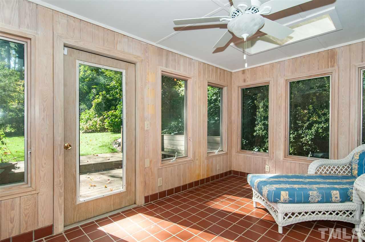 2707 North Mayview Road Raleigh, NC 27607 - Photo 15 of 25 a view of a dining room with furniture window and outside view