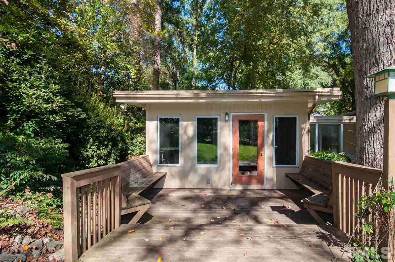 2707 North Mayview Road Raleigh, NC 27607 - Photo 17 of 25 a view of a house with backyard and porch
