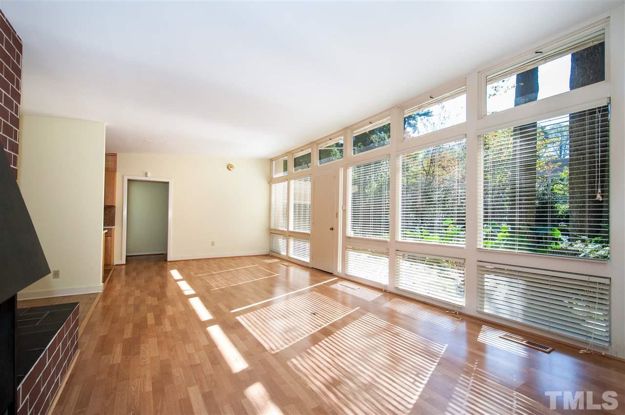 2707 North Mayview Road Raleigh, NC 27607 - Photo 7 of 25 a view of a room with wooden floor and windows