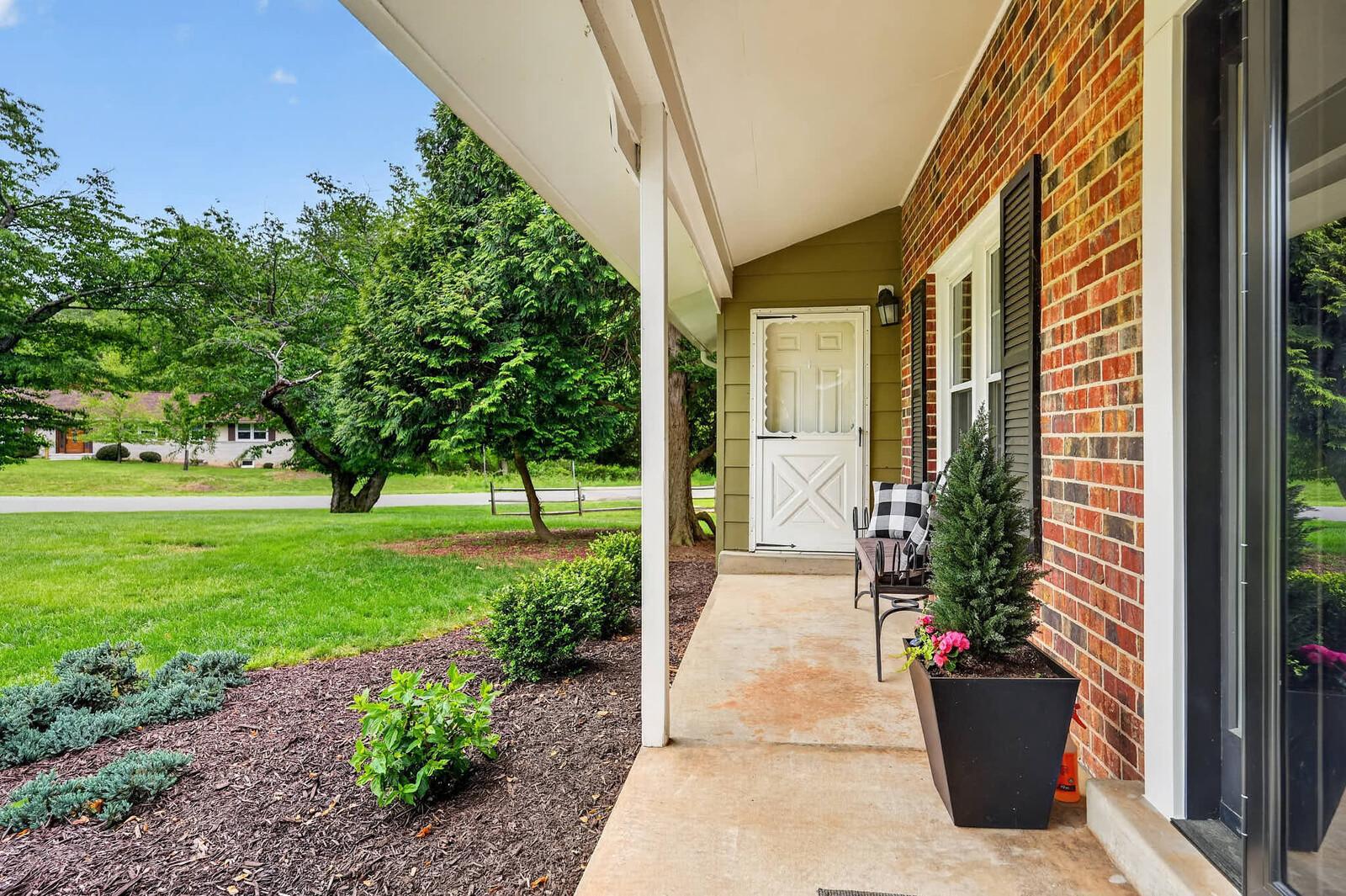 500 Finsbury Road Silver Spring, MD 20904 - Photo 5 of 54 a view of a house with backyard and garden