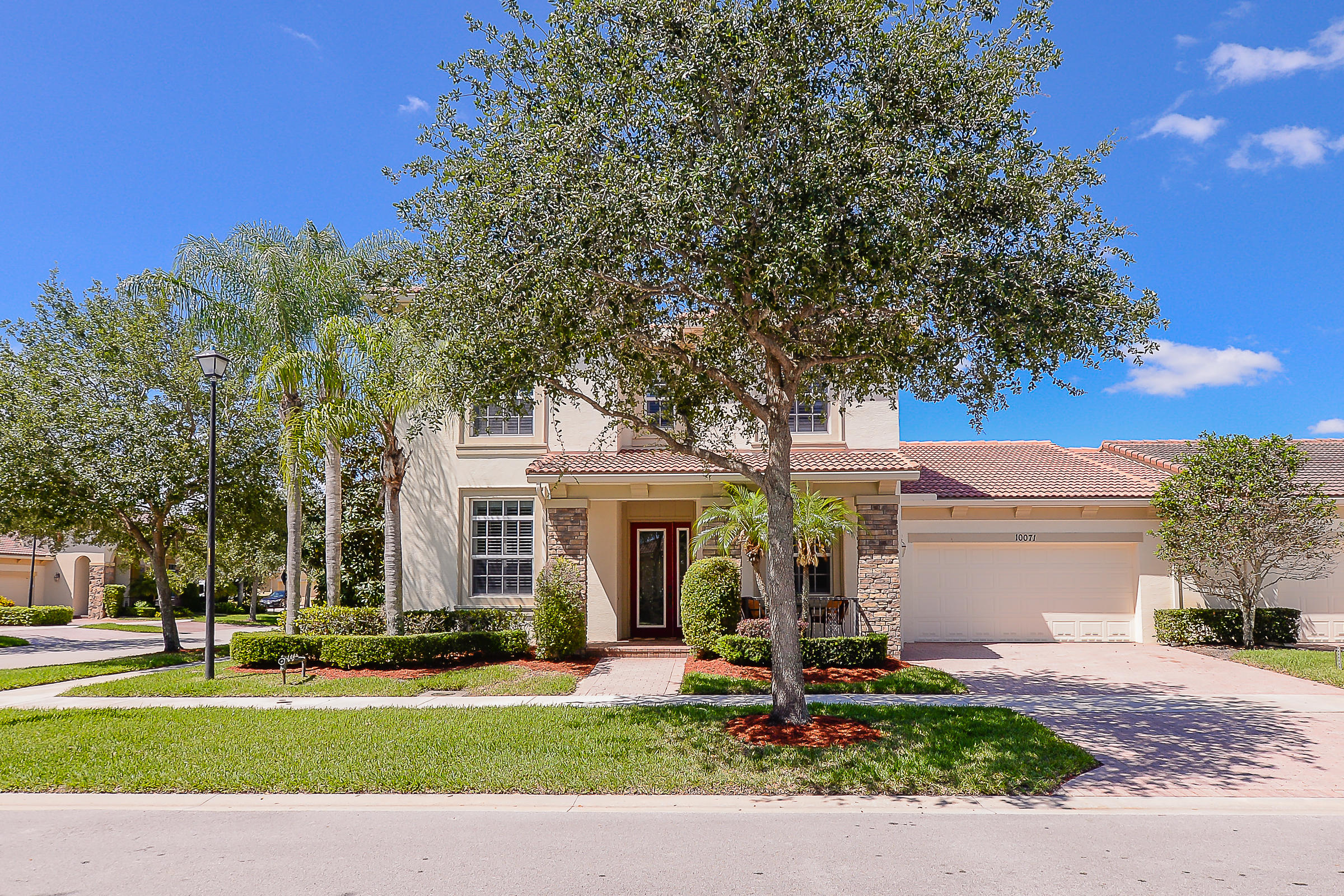10071 Southwest Dolce Road Port St. Lucie, FL 34986 - Photo 1 of 55 Front house