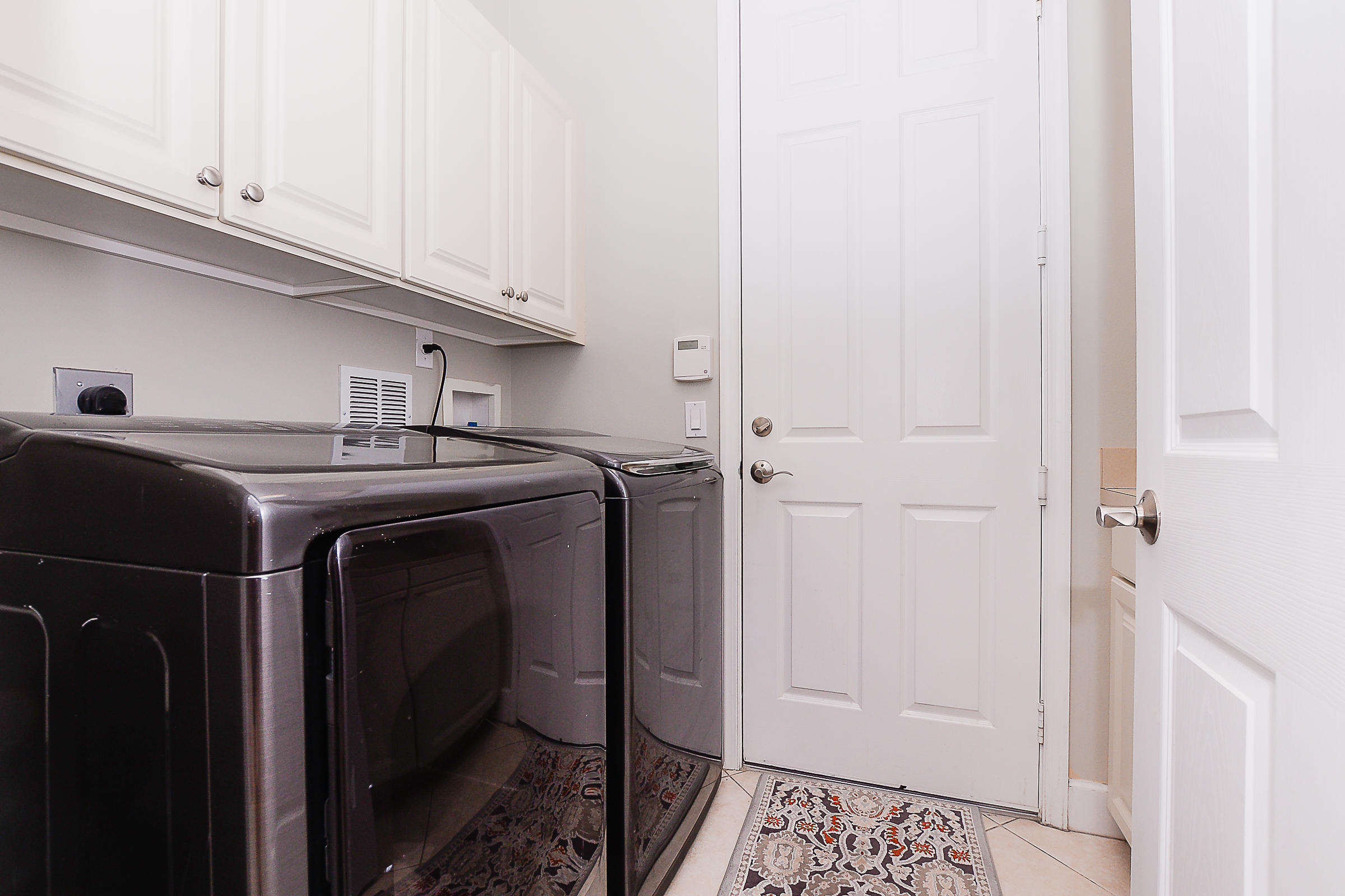 10071 Southwest Dolce Road Port St. Lucie, FL 34986 - Photo 18 of 55 Laundry Room