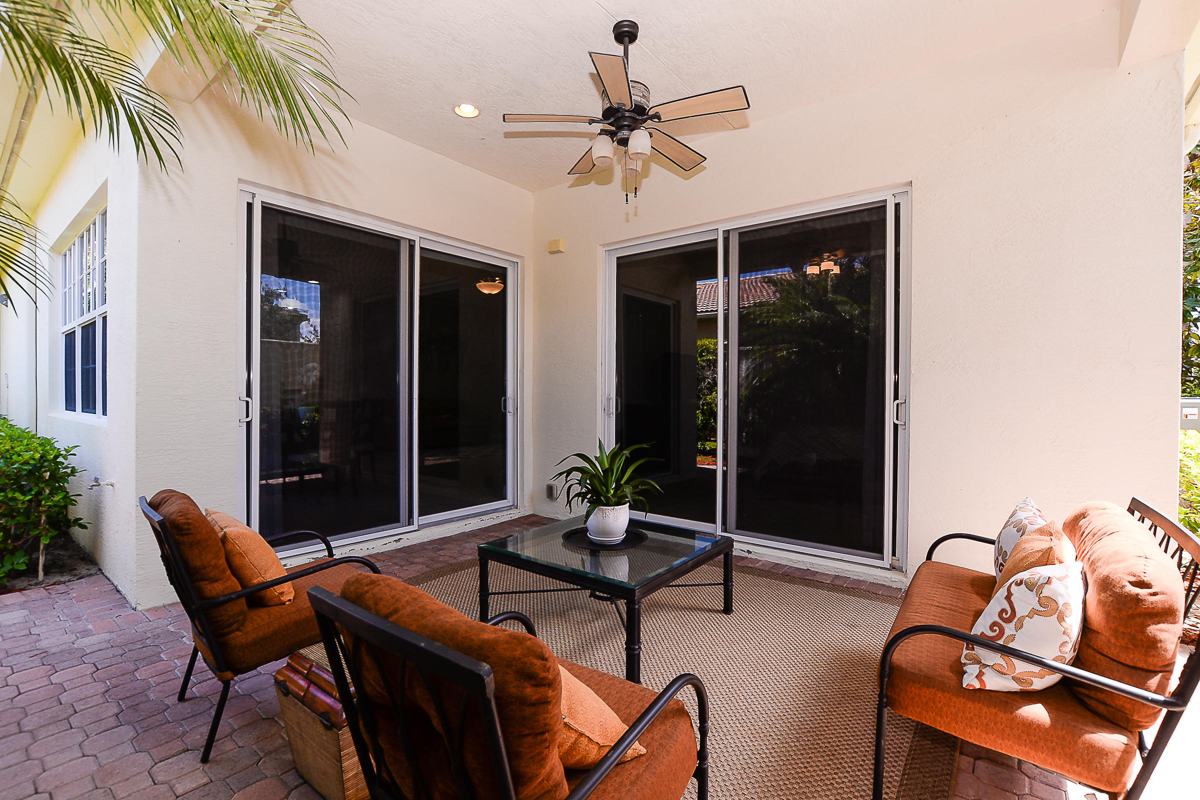 10071 Southwest Dolce Road Port St. Lucie, FL 34986 - Photo 37 of 55 Rear Patio