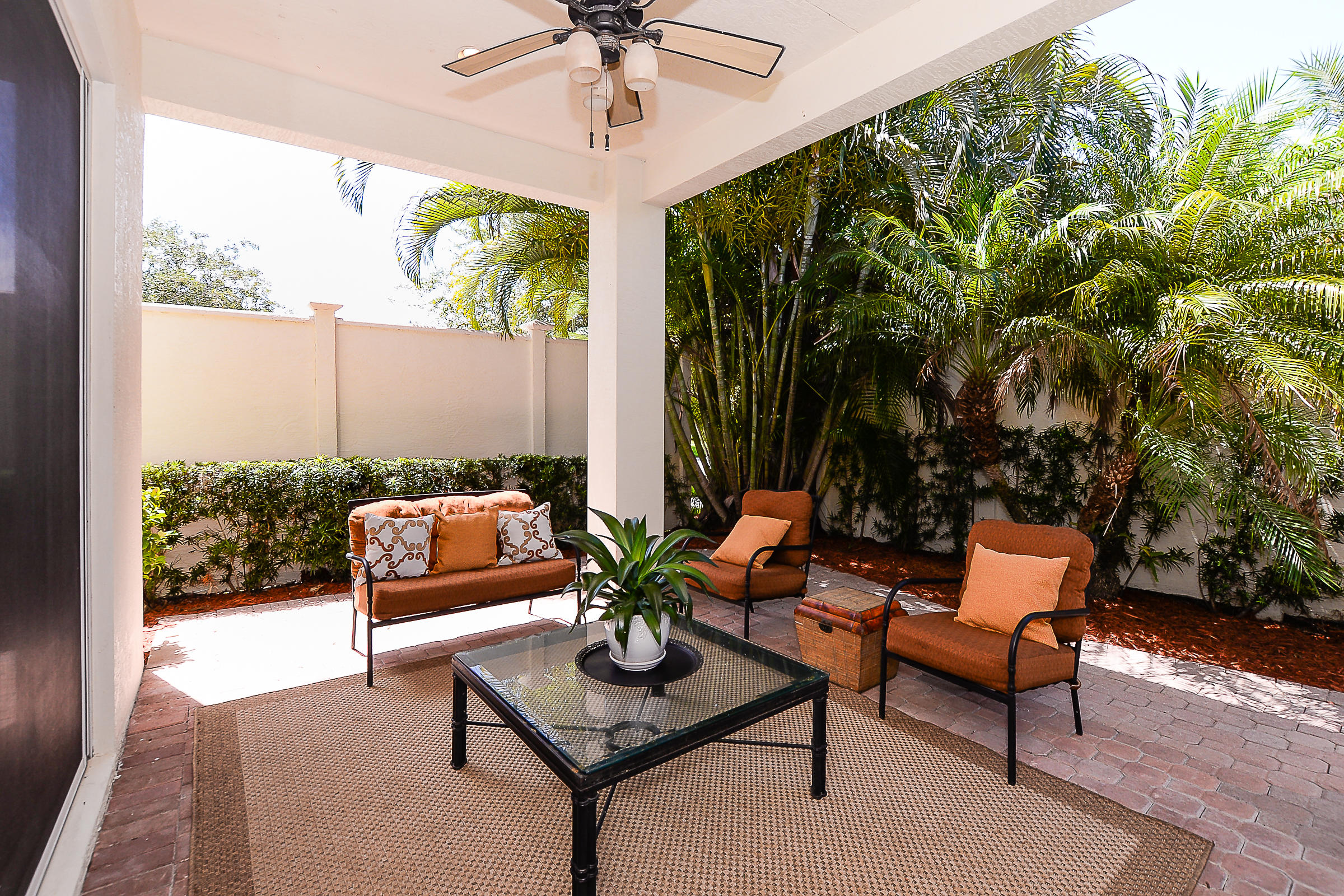 10071 Southwest Dolce Road Port St. Lucie, FL 34986 - Photo 38 of 55 Rear Patio