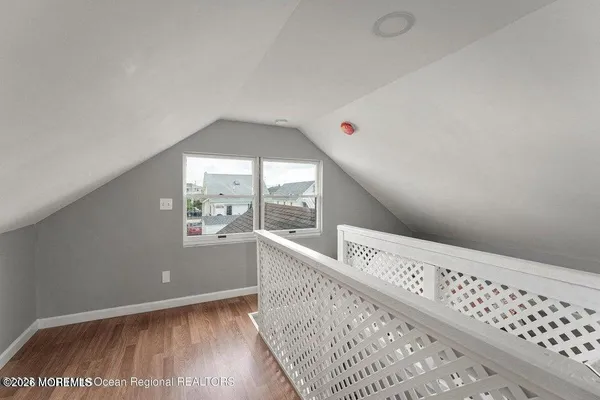 a view of a hallway with a window