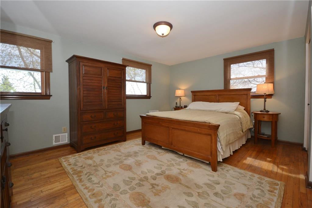 515 Guyasuta Road Aspinwall, PA 15215 - Photo 14 of 25 Master bedroom with hardwood floors and lots of closet space and natural light.