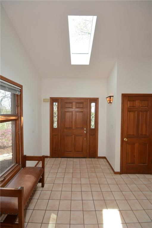 515 Guyasuta Road Aspinwall, PA 15215 - Photo 4 of 25 Beautiful stained woodwork, tile flooring in the bright entry.