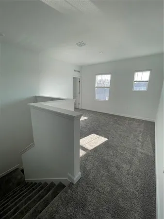 a view of a room with blue racks on the wall