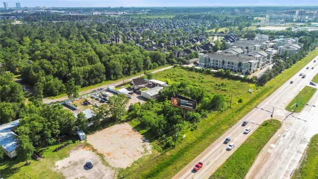 a view of a yard with an outdoor seating