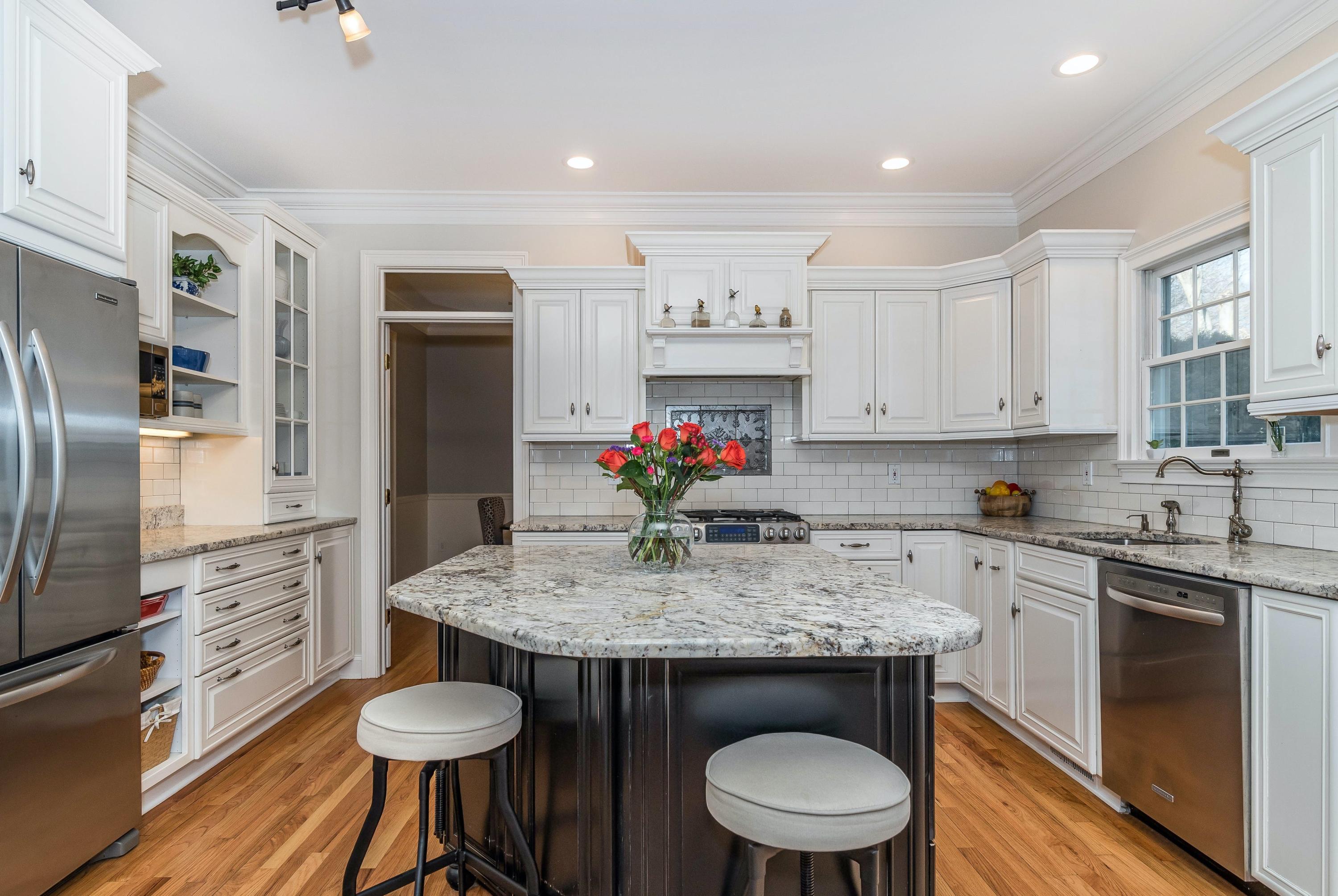 3 Fresh Meadows Lane Darien, CT 06820 - Photo 13 of 39 a kitchen with stainless steel appliances a sink stove and refrigerator