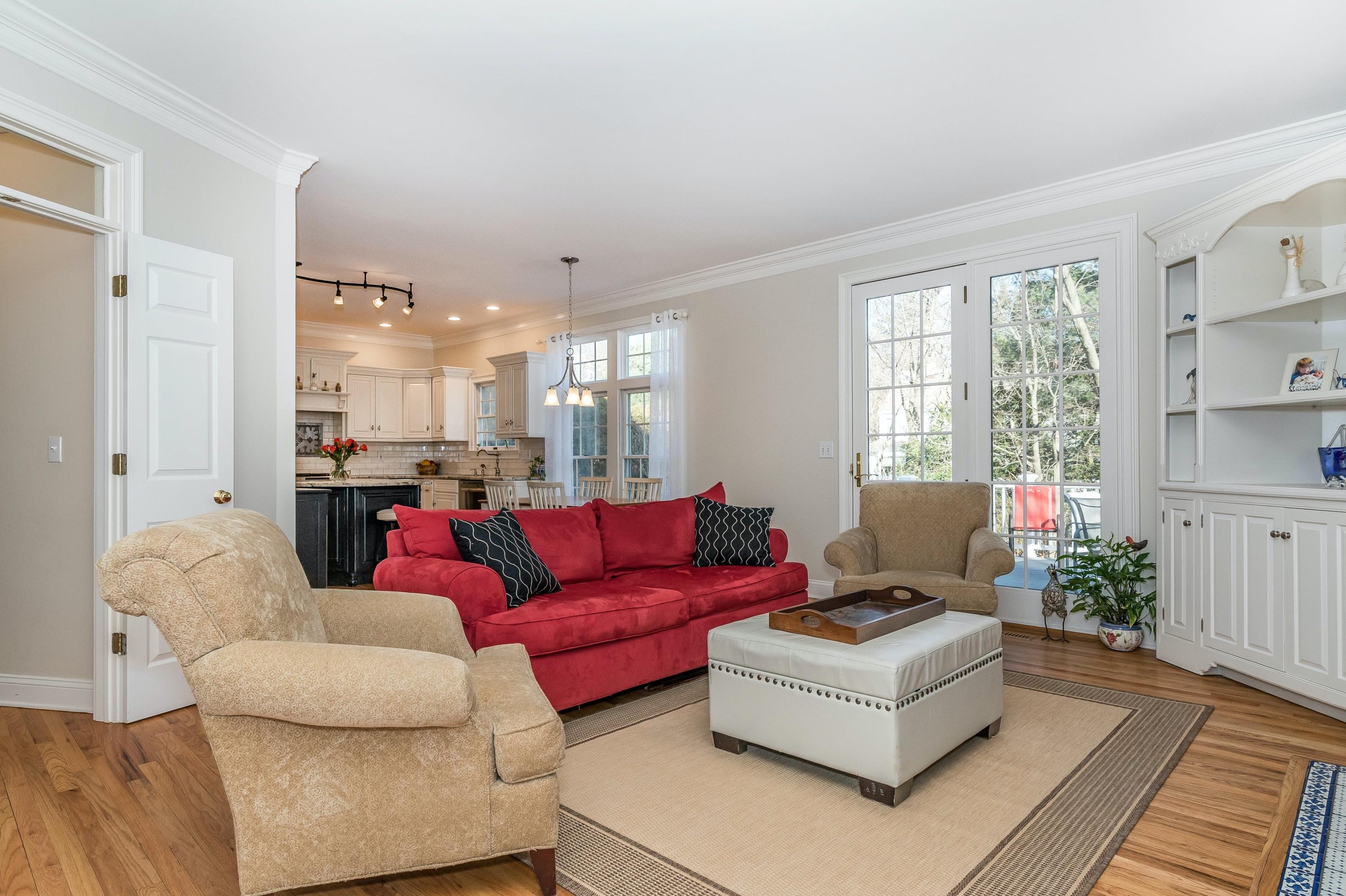 3 Fresh Meadows Lane Darien, CT 06820 - Photo 17 of 39 a living room with furniture and a large window