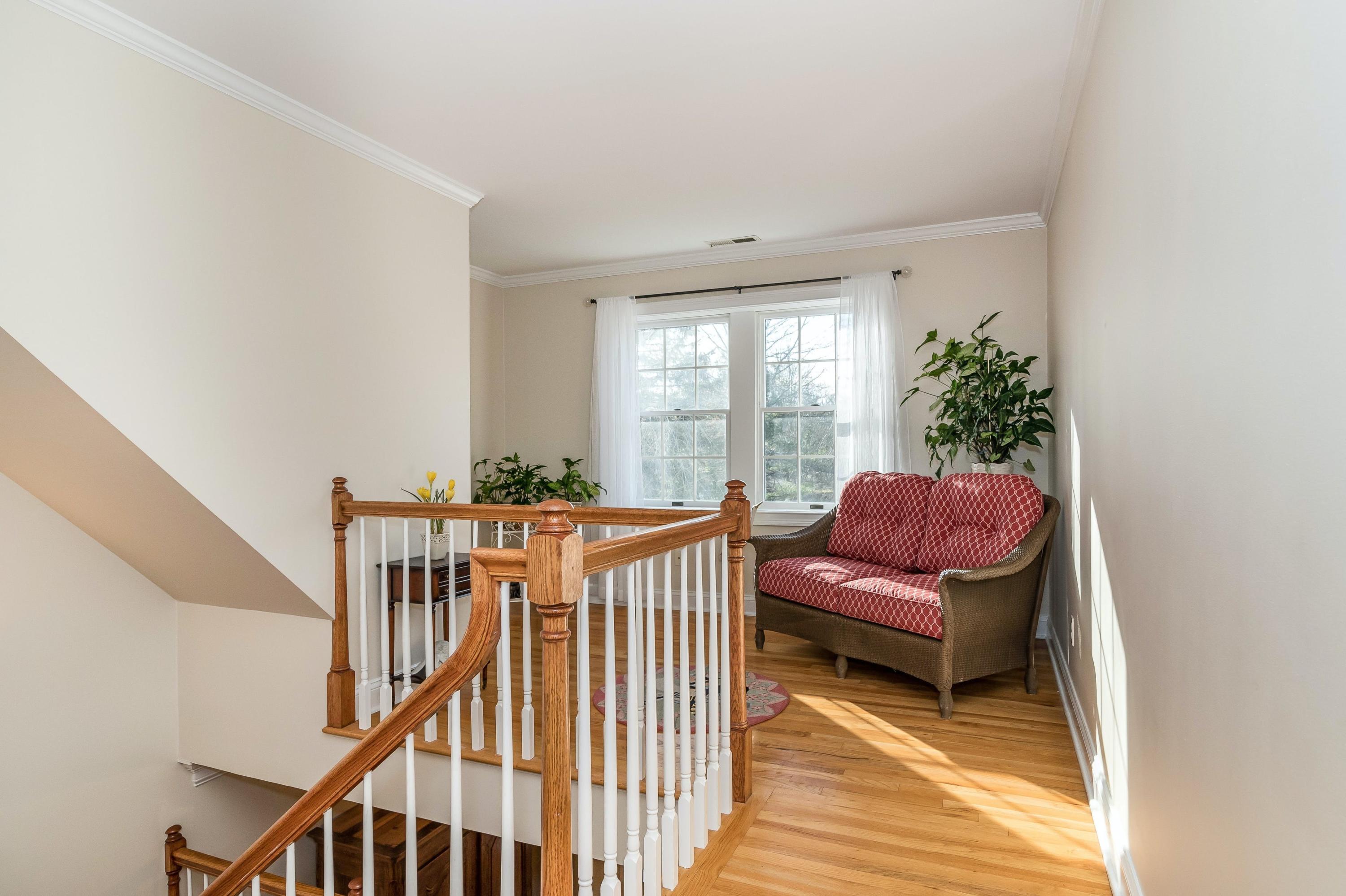 3 Fresh Meadows Lane Darien, CT 06820 - Photo 21 of 39 a balcony with furniture and a window