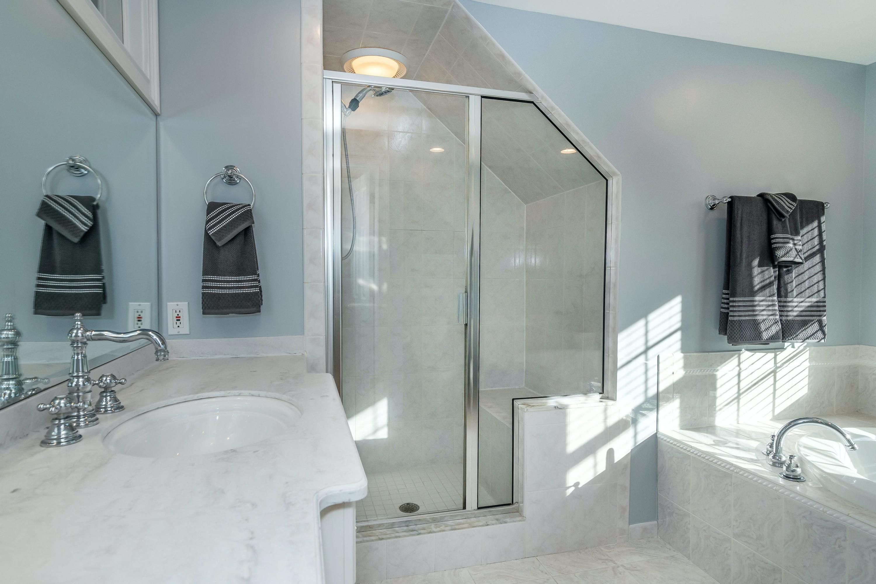 3 Fresh Meadows Lane Darien, CT 06820 - Photo 26 of 39 a bathroom with a bathtub and a sink