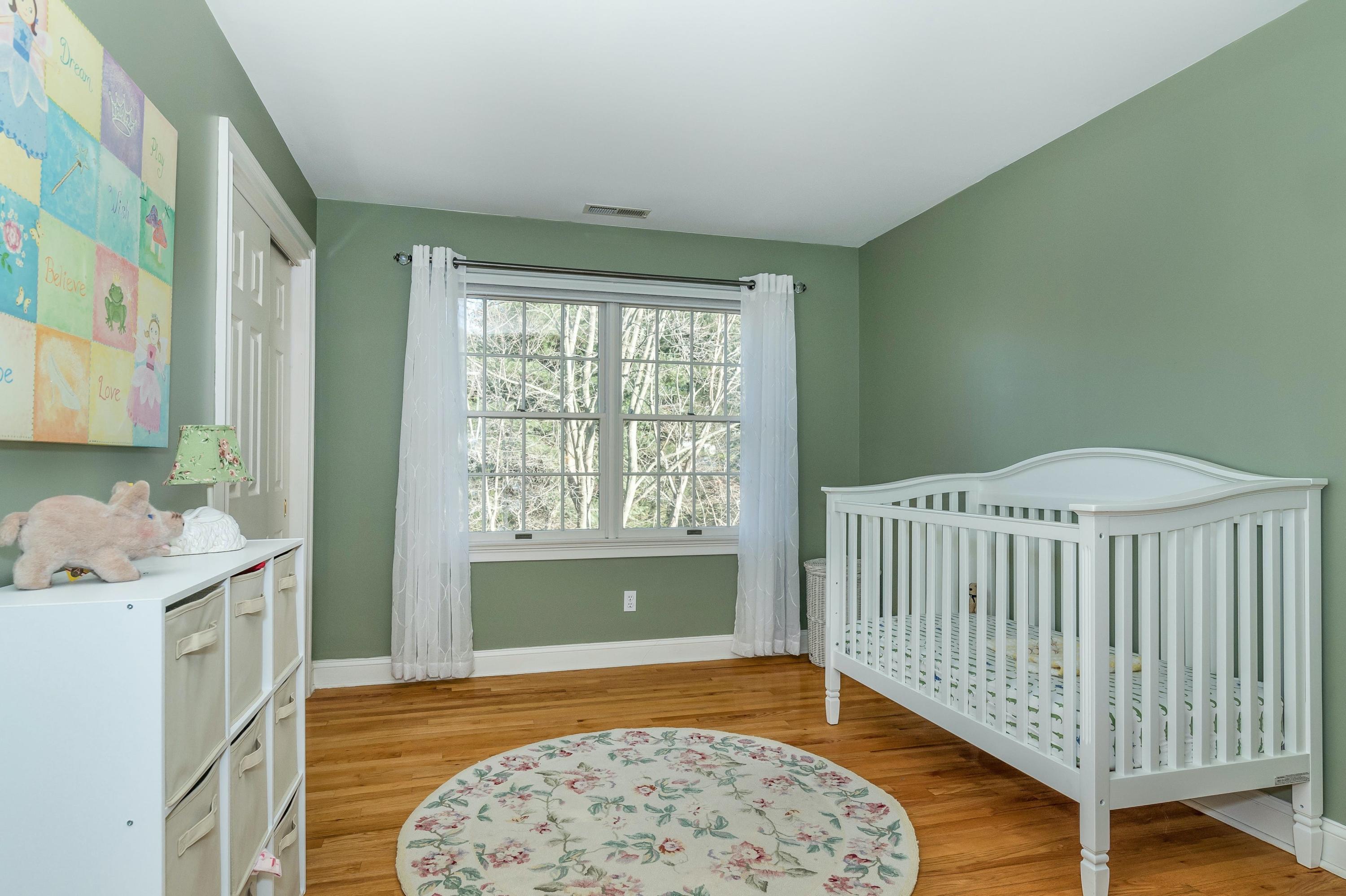 3 Fresh Meadows Lane Darien, CT 06820 - Photo 29 of 39 a bedroom with a bed and a window