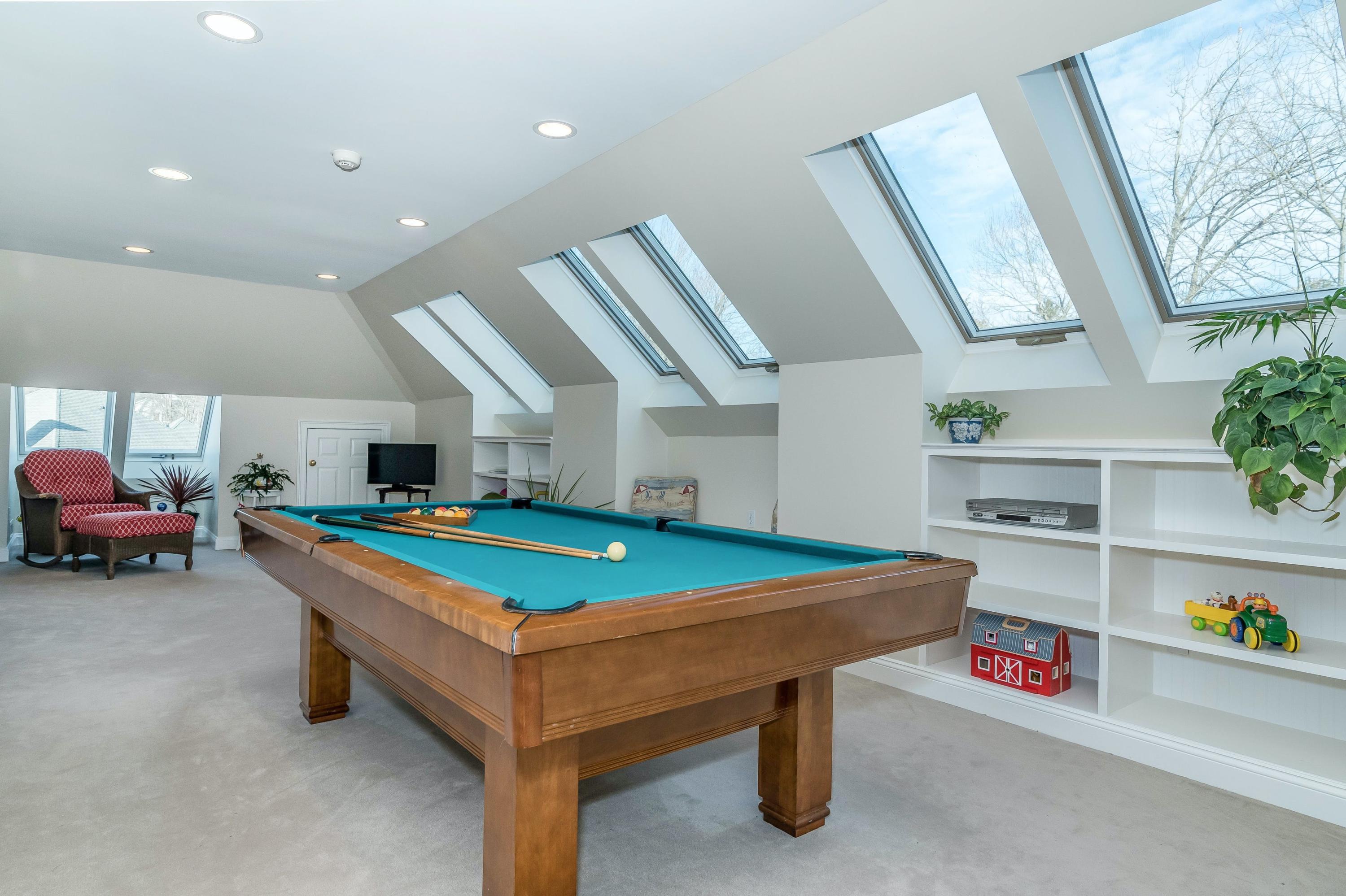 3 Fresh Meadows Lane Darien, CT 06820 - Photo 31 of 39 a room with furniture and a table