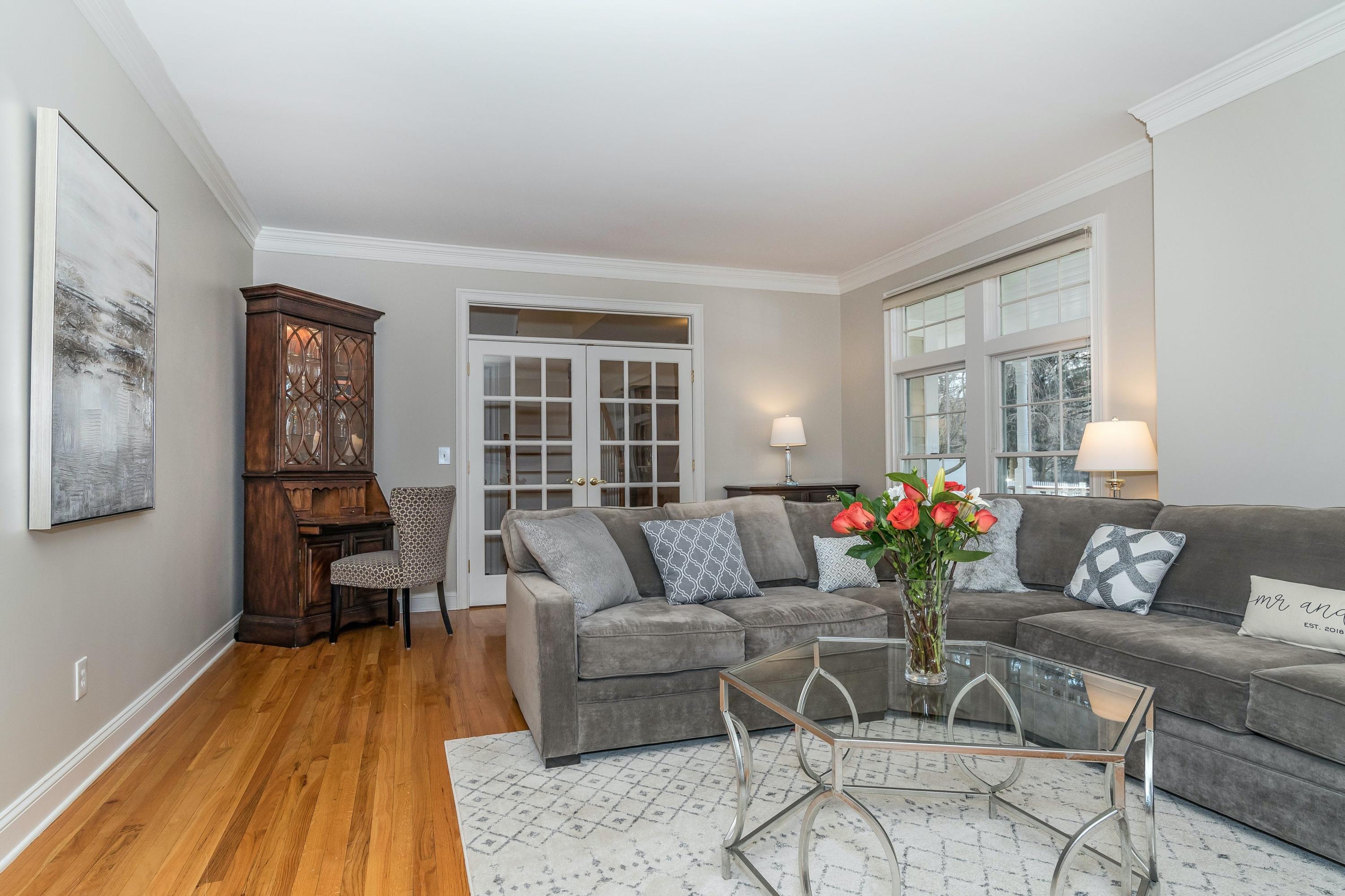 3 Fresh Meadows Lane Darien, CT 06820 - Photo 7 of 39 a living room with furniture and wooden floor