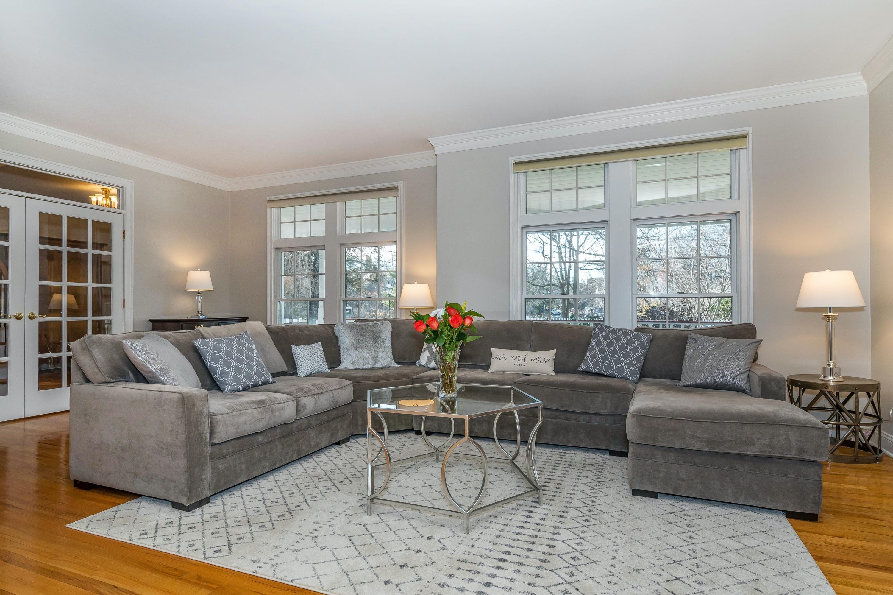 3 Fresh Meadows Lane Darien, CT 06820 - Photo 9 of 39 a living room with furniture and a large window